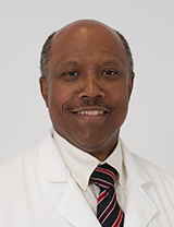 Photo of George W. Moore, M.D., M.Sc., FACPM, FACOEM